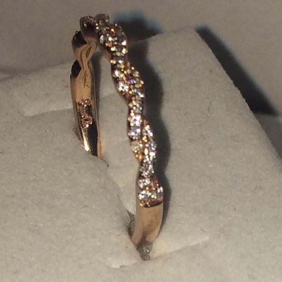 Stunning 14K Rose Gold And Diamond encrusted Ring.